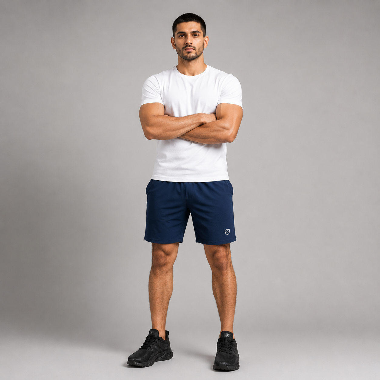 A man wearing a high quality navy blue athletic shorts stretchable material 