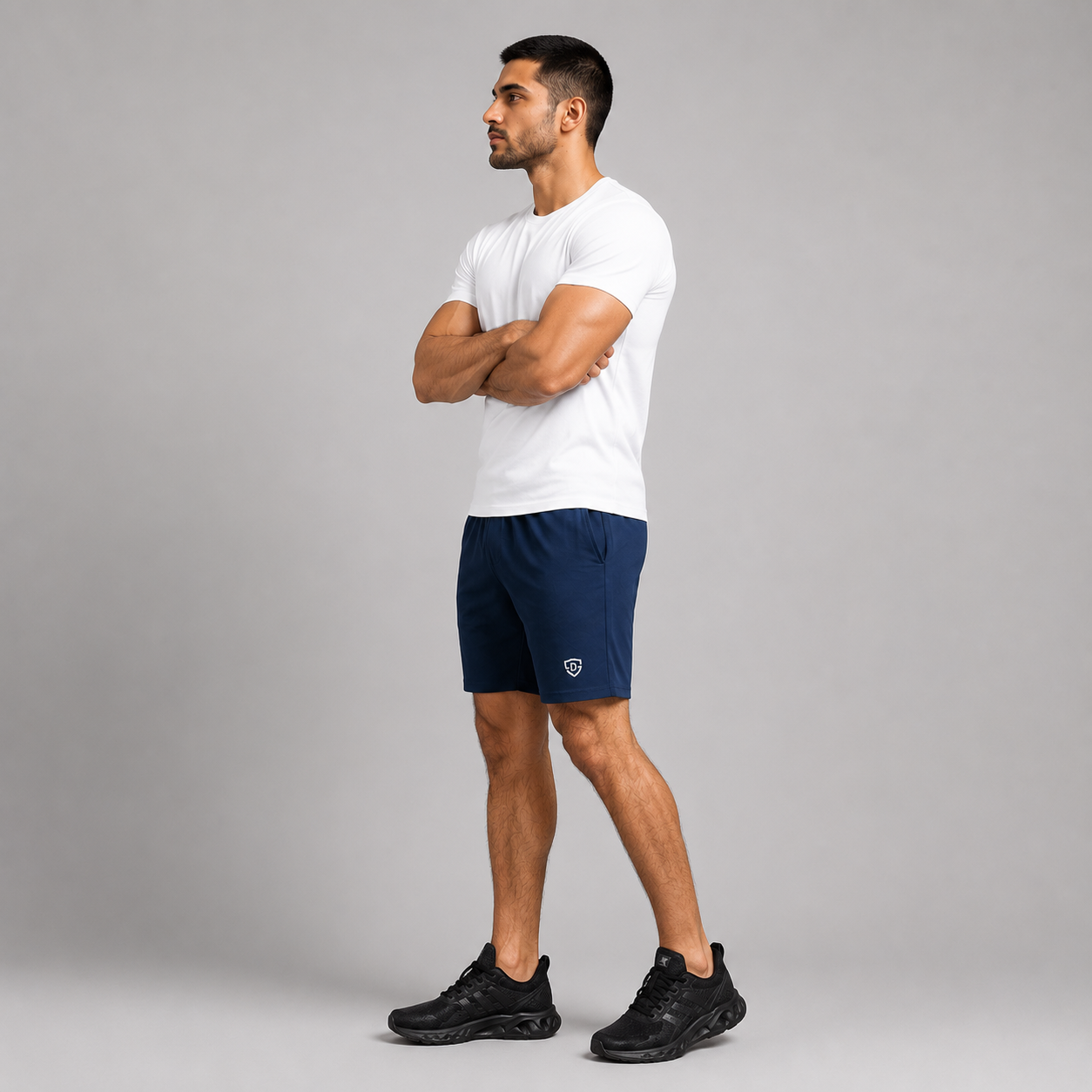 A man wearing a high quality navy blue athletic shorts stretchable material 