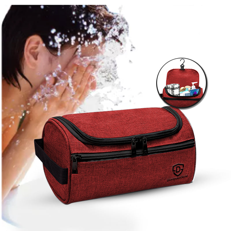 Red/Maroon colored, waterproof, hanging toiletry bag with inner and outer pockets.